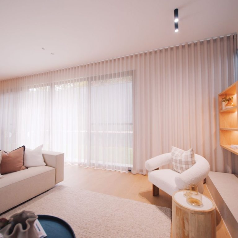 Complete Shutters Australia -Floor to ceiling sheer curtains in family room
