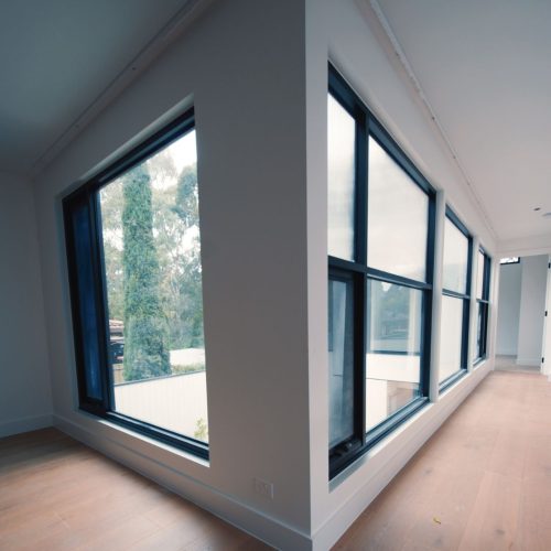 Complete Shutters Australia windows in hall way